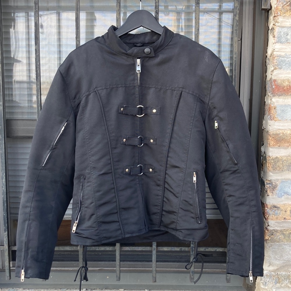 Women’s motorcycle jacket with protective padding built in (leather-free)